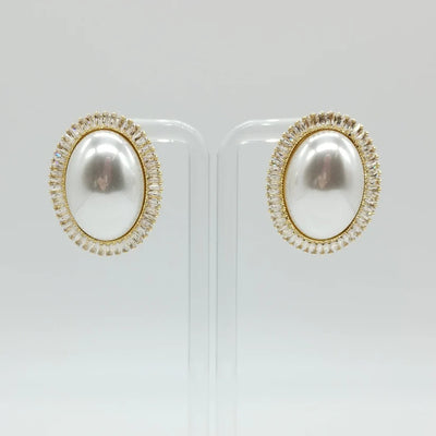 Orecchini di zirconi crystal e perla centrale, chiusura classica e rodiatura in argento o oro