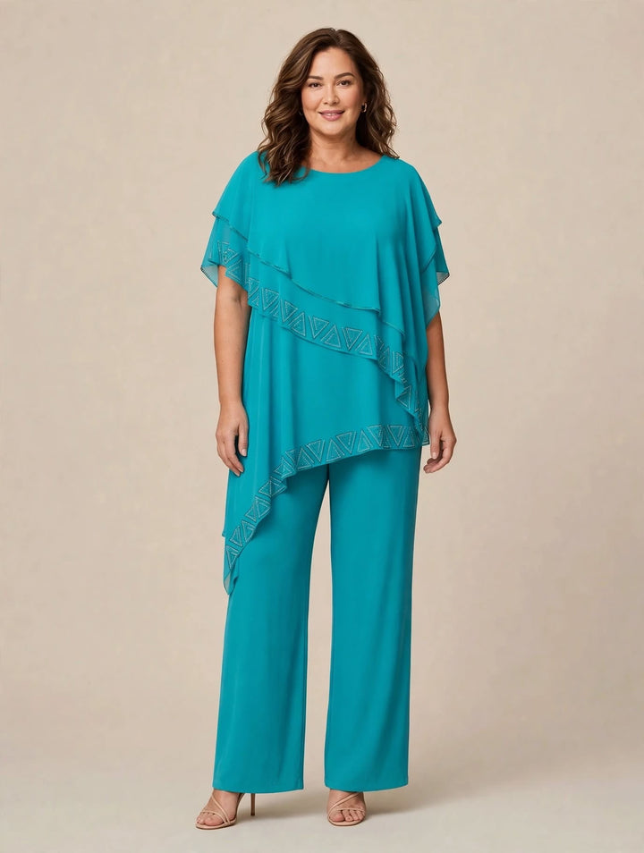 MERY LÒ - TUTA JUMPSUIT IN JERSEY CON PONCHO ASIMMETRICO IN CHIFFON E BORDI GEOMETRICI IN STRASS