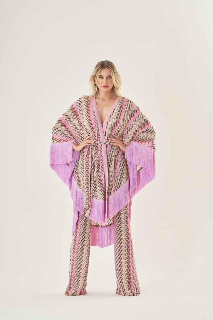 PHO FIRENZE - PONCHO IN VISCOSA E LUREX ORO IN FANTASIA CON PASSANTI PER FASCIA IN TINTA ALTEZZA VITA.