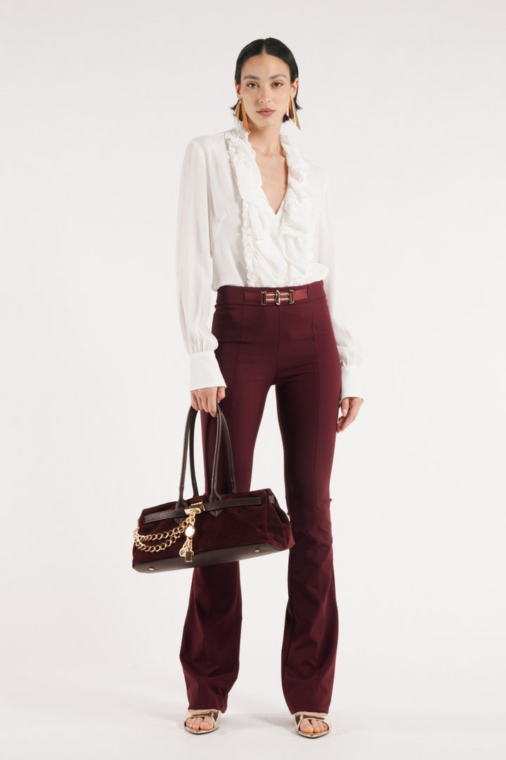 BABYLON - PANTALONI SVASATI ELASTICIZZATI CON GAMBA AMPIA E ACCESSORIO METALLICO DORATO 87% POLIAMMIDE + 13% ELASTAN