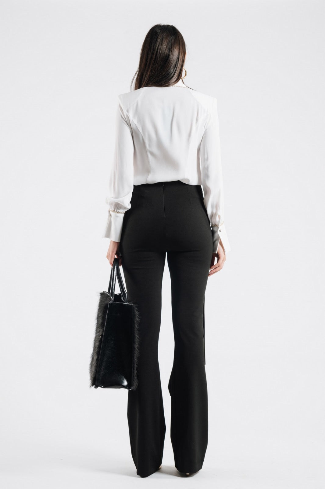 Pantaloni con fibbie
