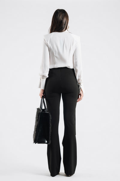 Pantaloni con fibbie