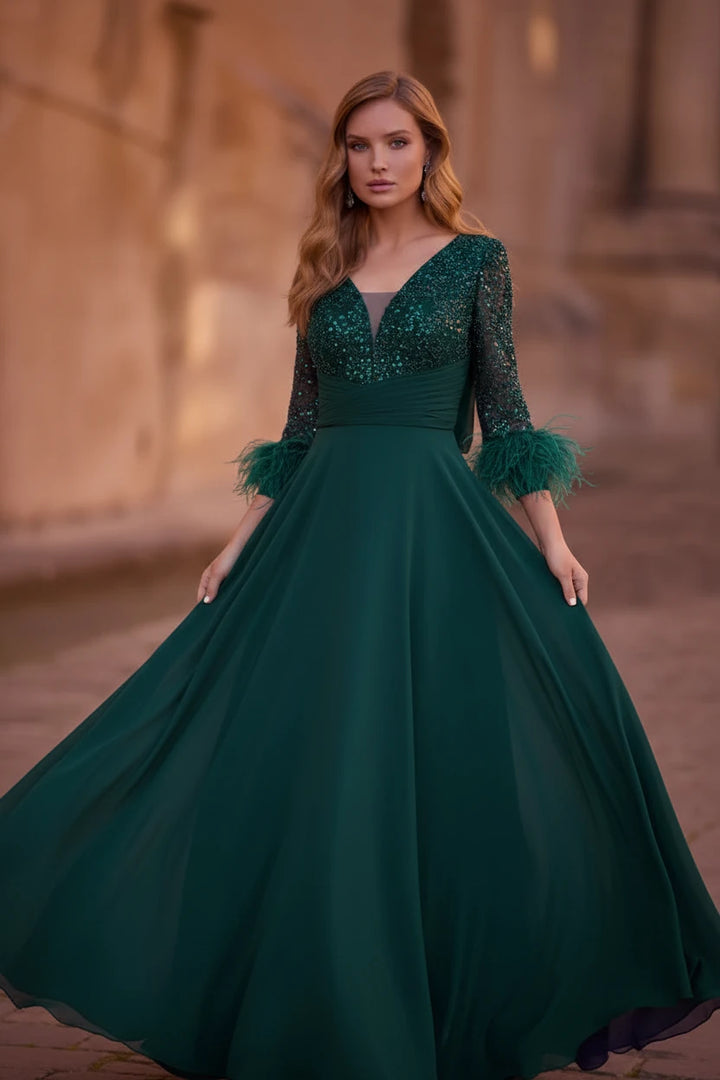 VENI INFANTINO - ABITO LUNGO CON SCOLLO A V BRILLANTINATO CREA UN EFFETTO SCINTILLANTE ED ELEGANTE