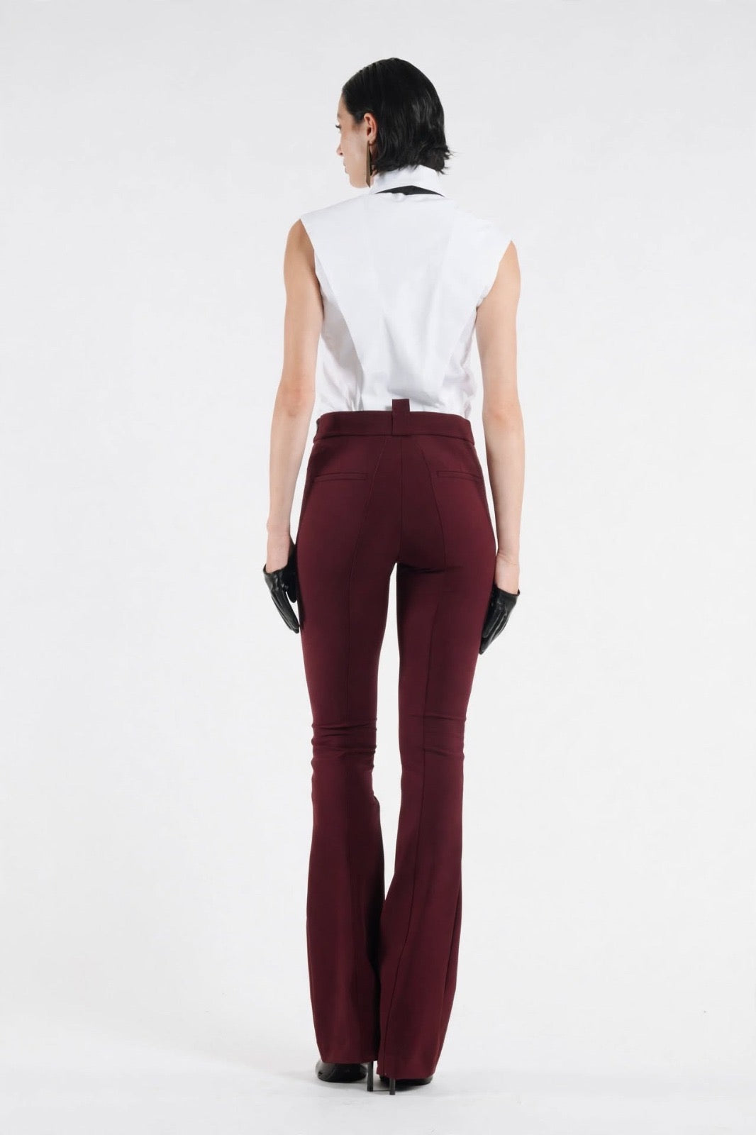 BABYLON - PANTALONI SVASATI ELASTICIZZATI CON GAMBA AMPIA E ACCESSORIO METALLICO DORATO 87% POLIAMMIDE + 13% ELASTAN