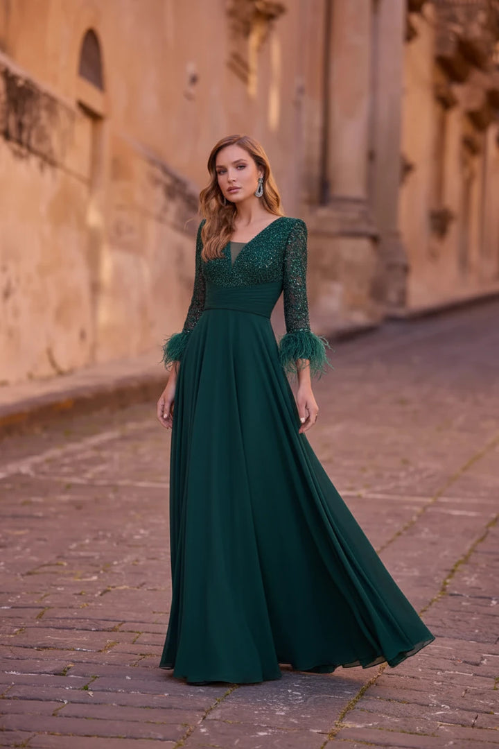 VENI INFANTINO - ABITO LUNGO CON SCOLLO A V BRILLANTINATO CREA UN EFFETTO SCINTILLANTE ED ELEGANTE