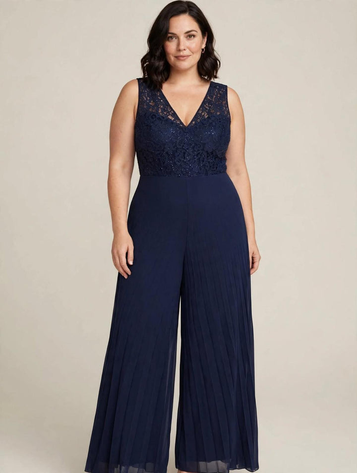 ANNA CAIAZZO - TUTA JUMPSUIT BLU NAVY CON CORPINO ILLUSION IN PIZZO CON STRASS A SCOLLO A V E PANTALONE WIDE-LEG IN CHIFFON PLISSÉ