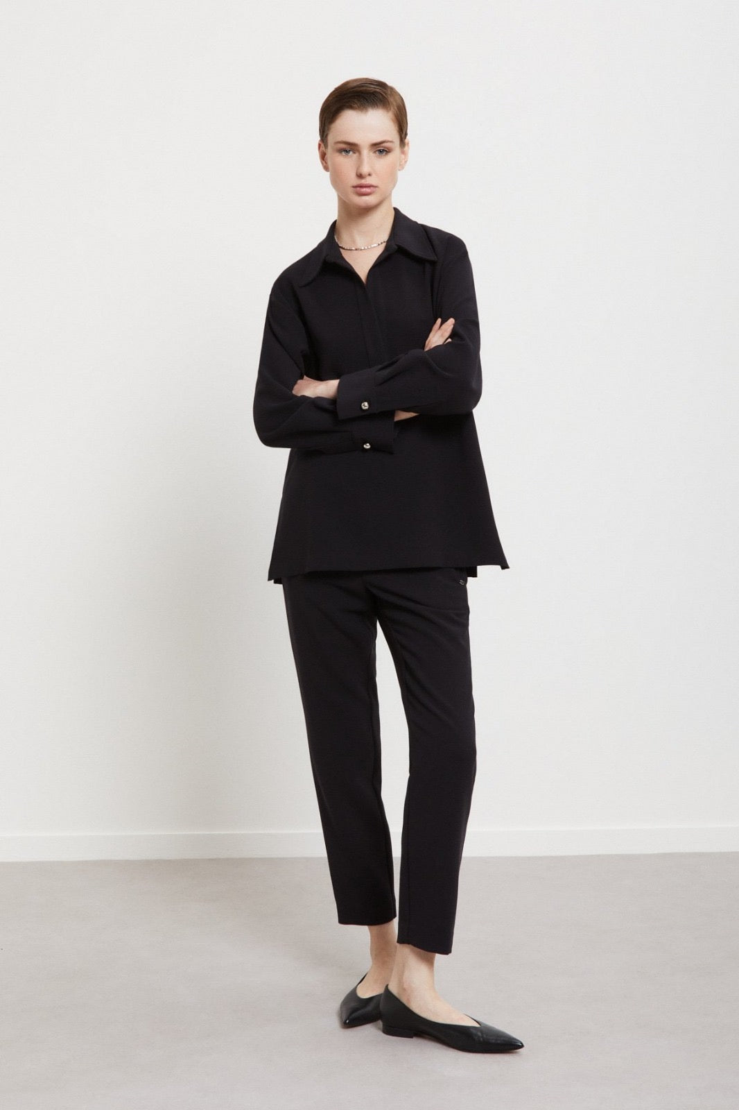 Blusa con scollo polo