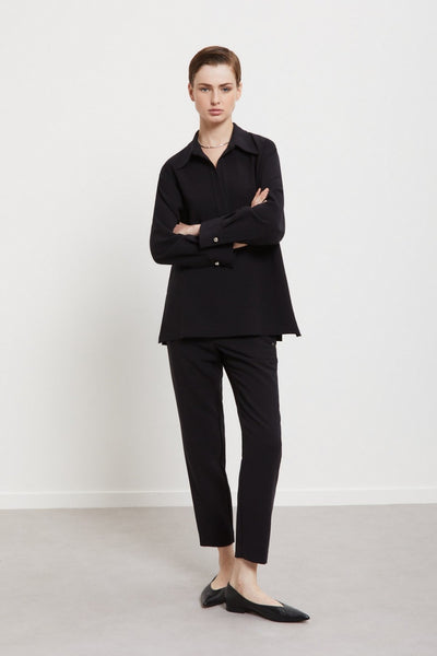 Blusa con scollo polo