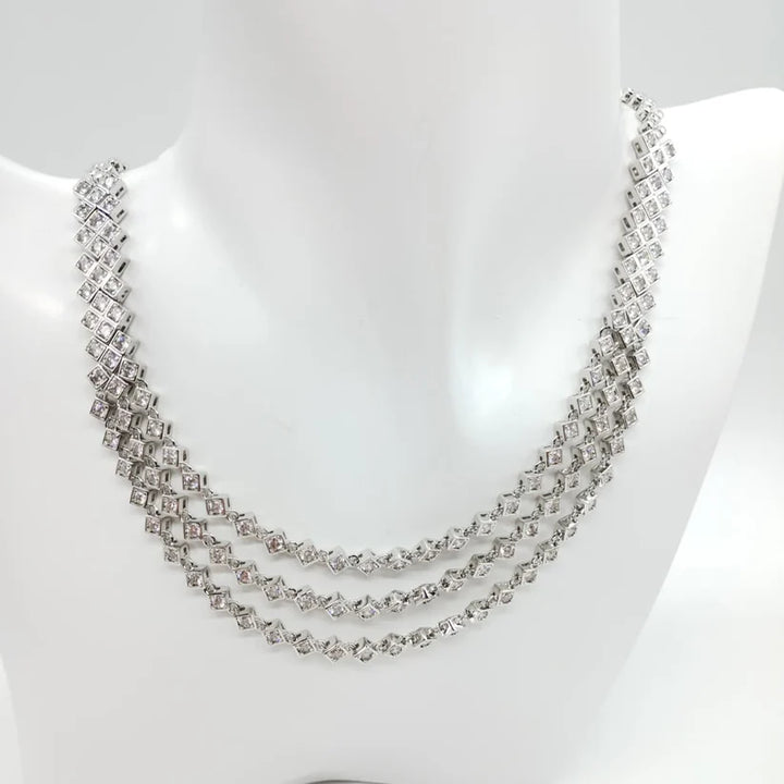 Parure di zirconi color crystal composta da collana e orecchini con rodiatura in argento