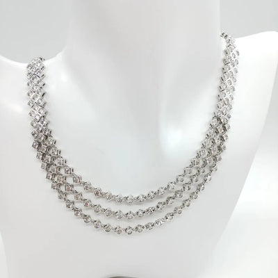 Parure di zirconi color crystal composta da collana e orecchini con rodiatura in argento