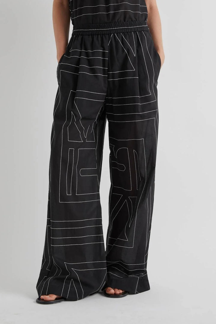 MEIMEI J - PANTALONE CON RICAMO LOGO ALL OVER