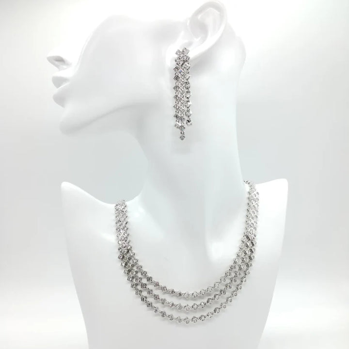 Parure di zirconi color crystal composta da collana e orecchini con rodiatura in argento