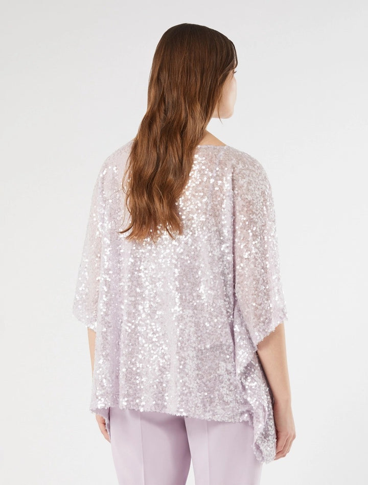 PERSONA - BRILLA DI STILE CON IL PONCHO IN PAILLETTES, DALLA LINEA AMPIA